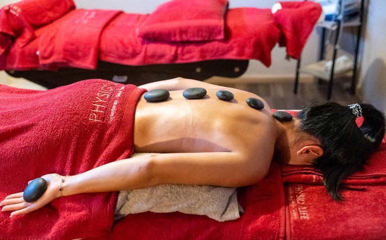 Hot stone massage treatment at Physiolife